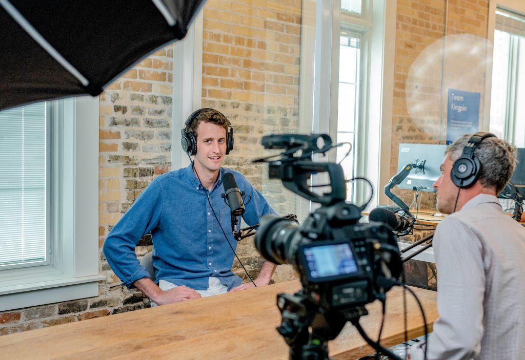 A camera shooting a Podcast